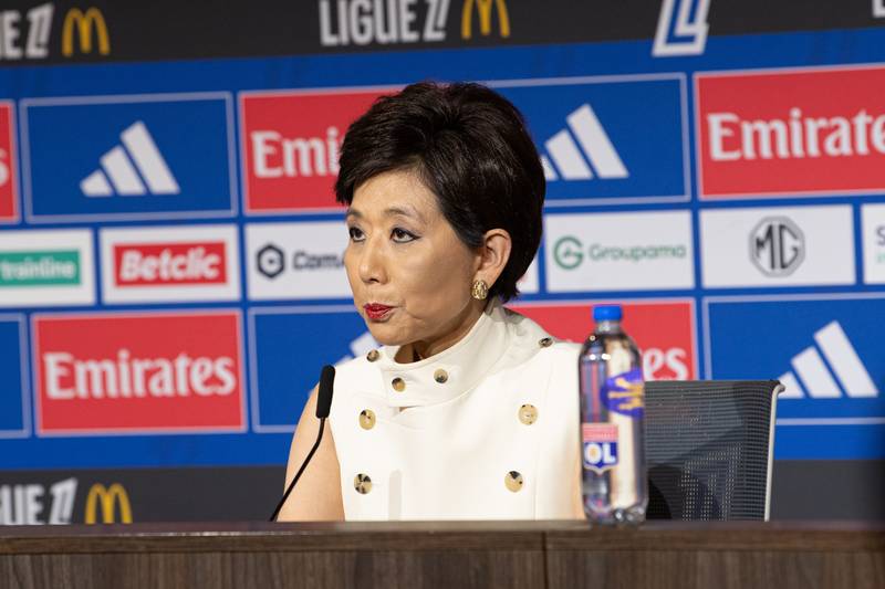 Michele Kang at a press conference